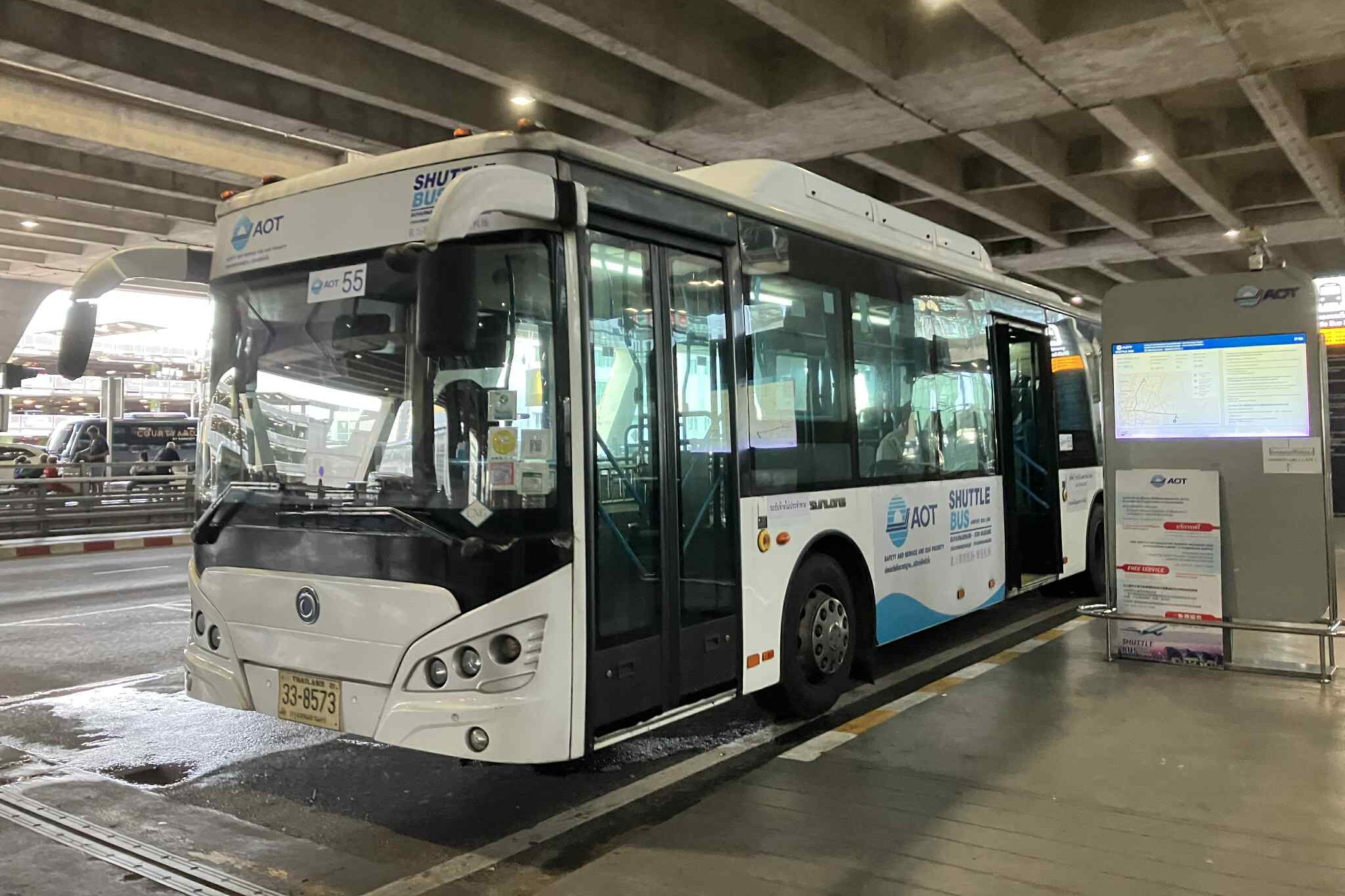 AOT free shuttle bus at Suvarnabhumi Airport transferring passengers to Don Mueang Airport