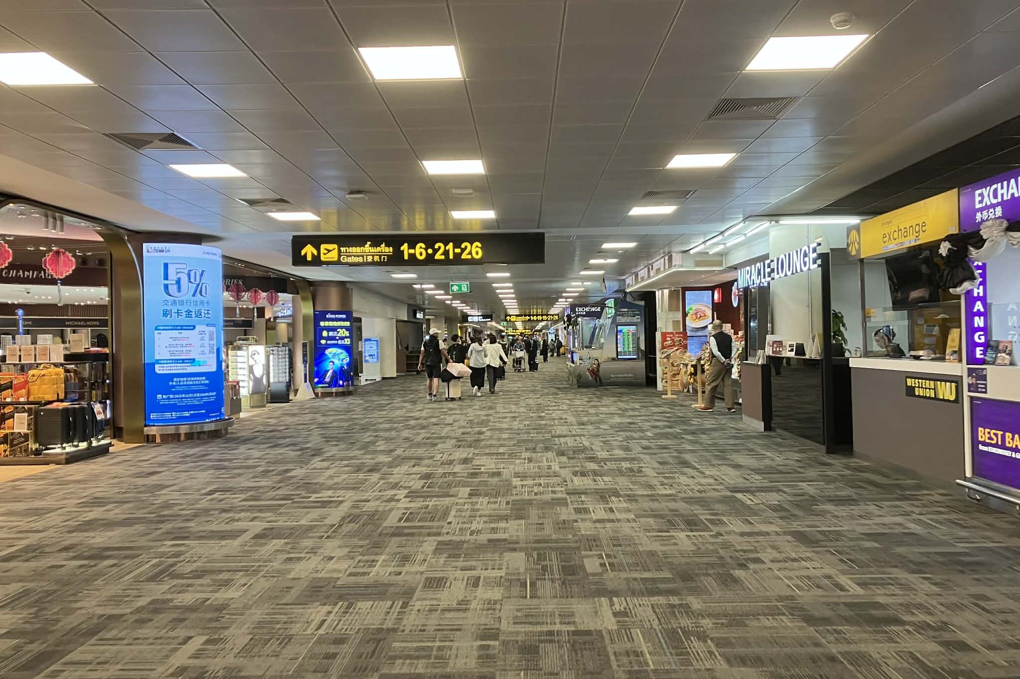 dmk terminal 1 miracle lounge location after security corridor