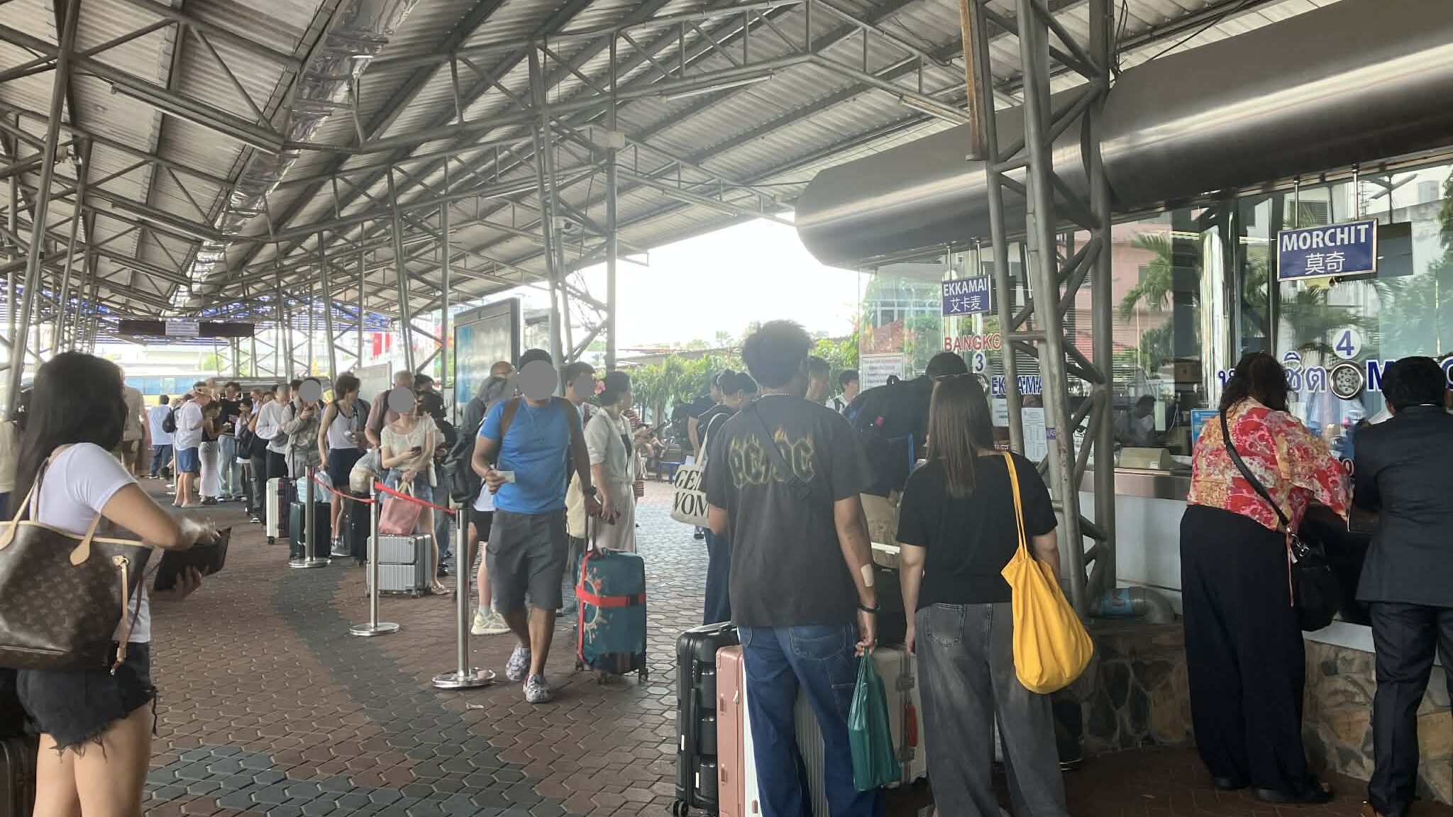 Long queue for bus tickets at North Pattaya Bus Terminal during Lunar New Year