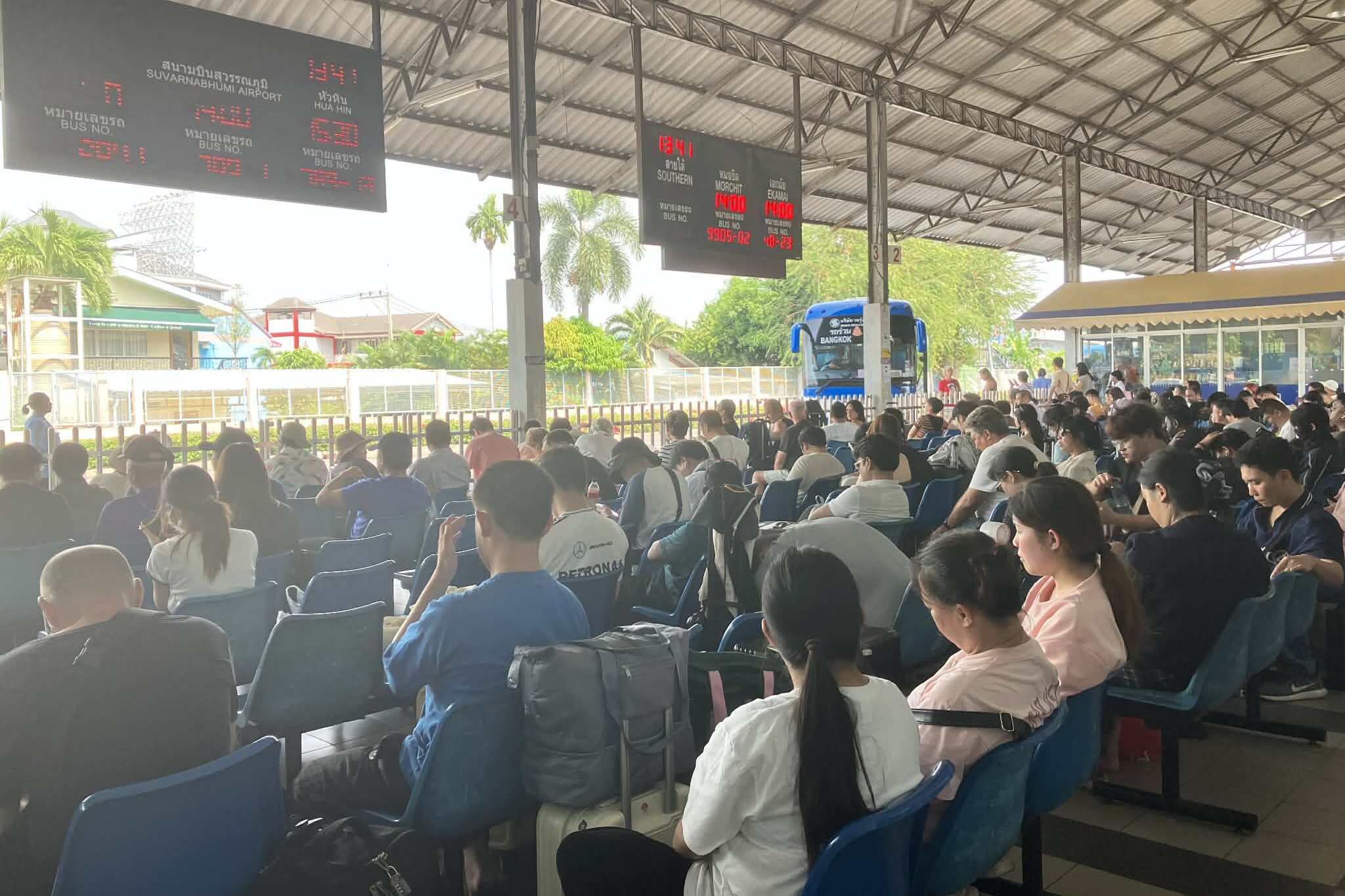 Crowded waiting area at North Pattaya Bus Terminal in the afternoon