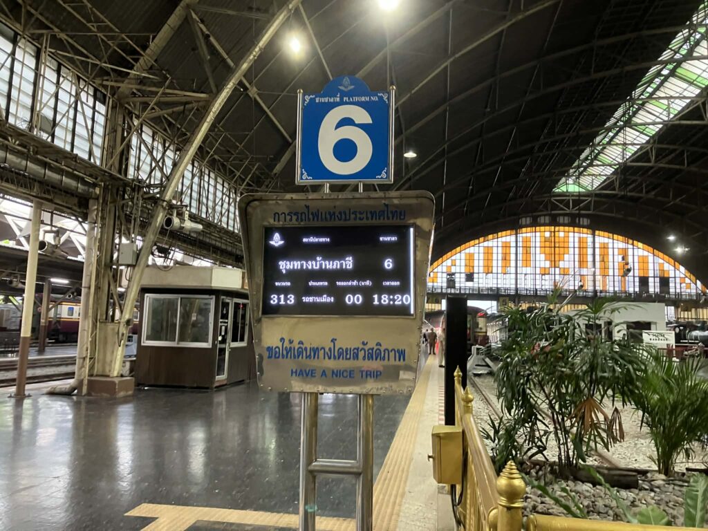 Platform sign for Train 313 at Hua Lamphong Station