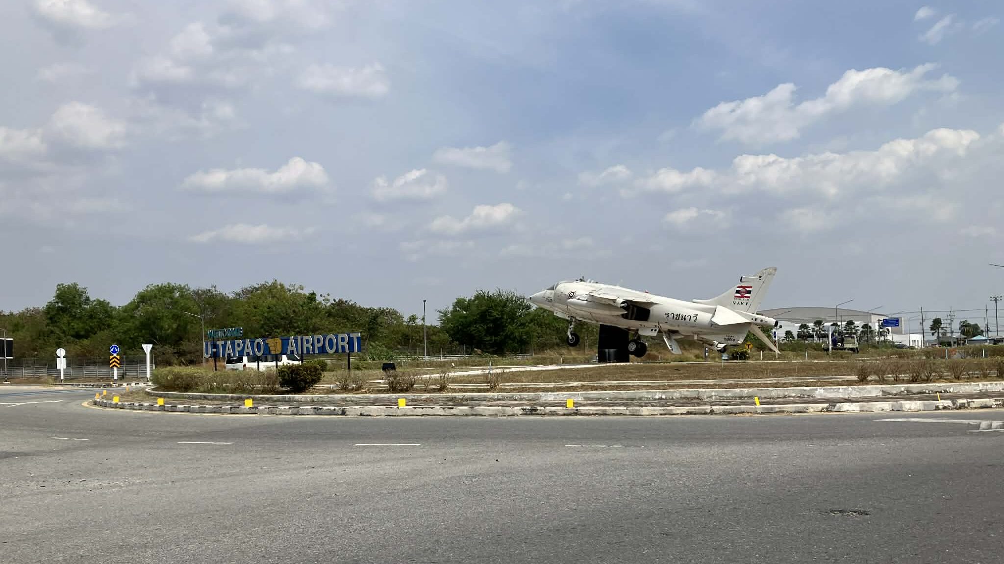 U-Tapao Airport welcome sign with aircraft monument